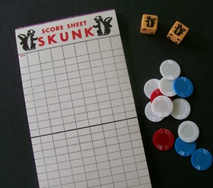 skunk dice, chips and score pad for dice game