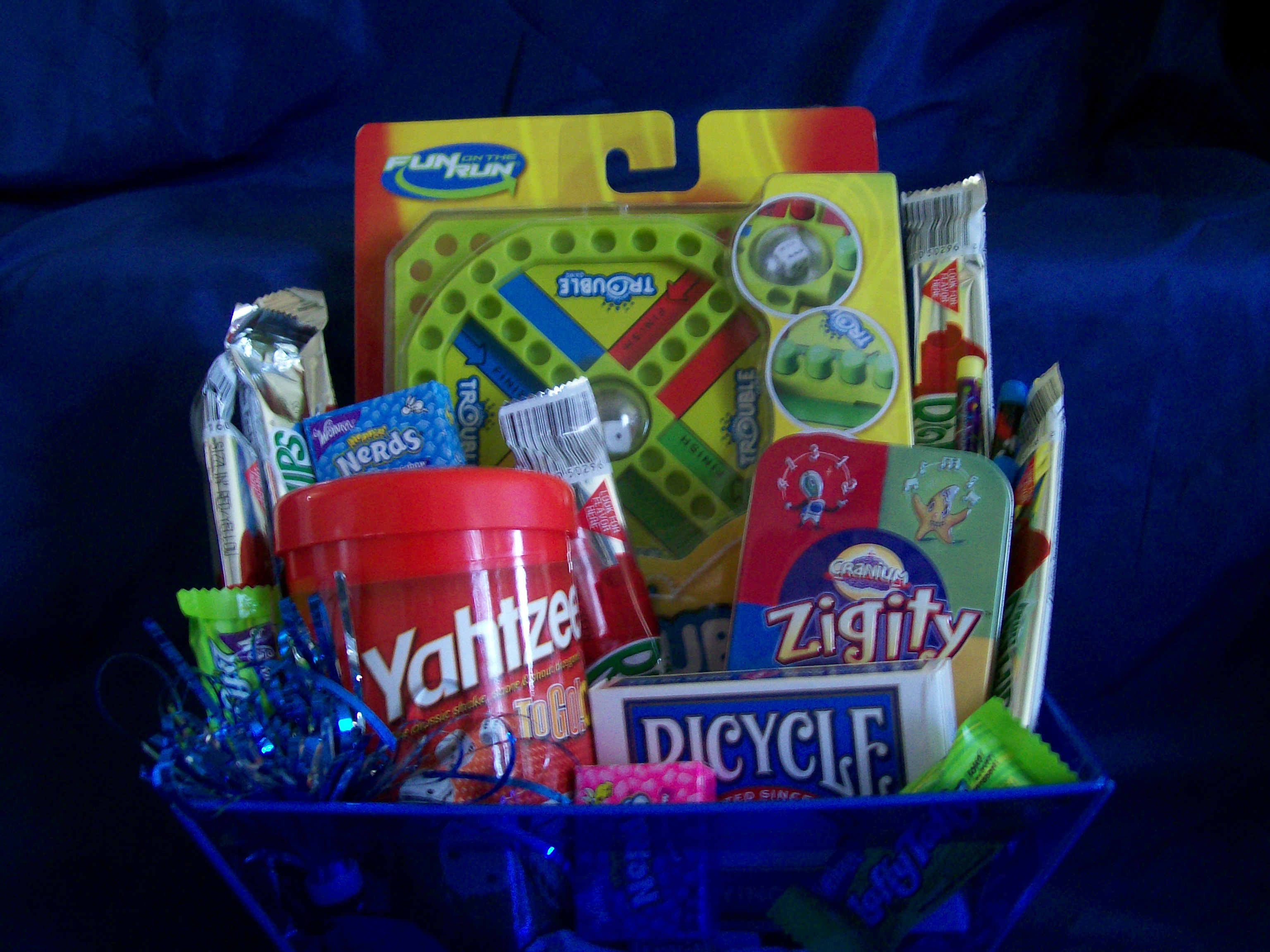 Surprise the Kids with a Travel Fun and Games Gift Basket